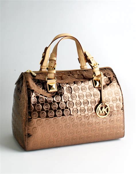 large michael kors hand bags|pictures of Michael Kors handbags.